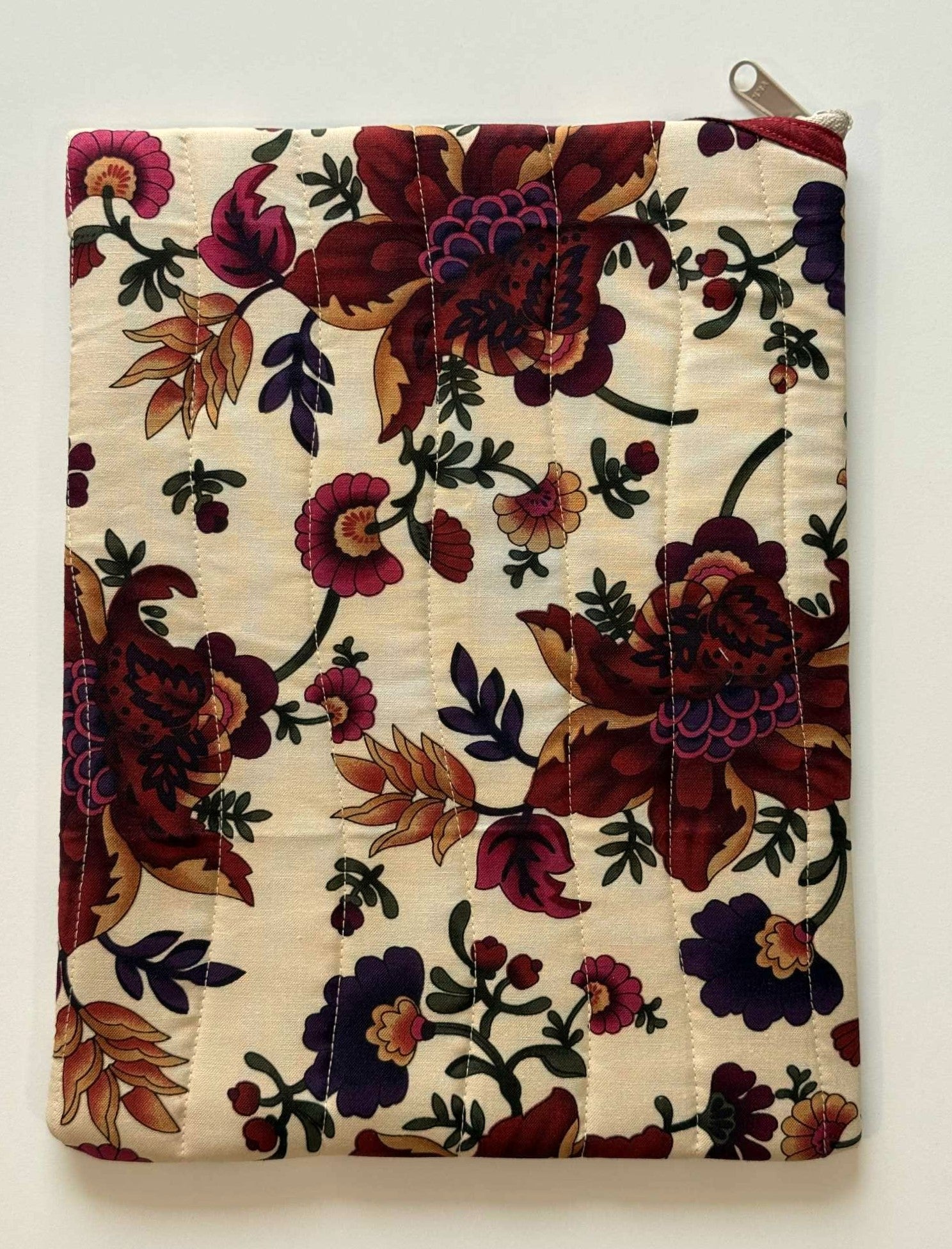 Handmade padded tablet pouch with diagonal zipper design