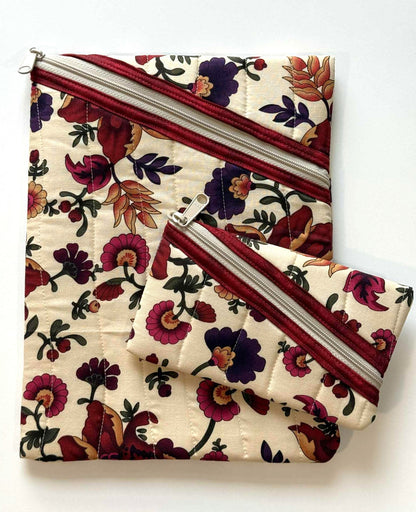 Floral quilted zipper pouches with vertical wavy stitching